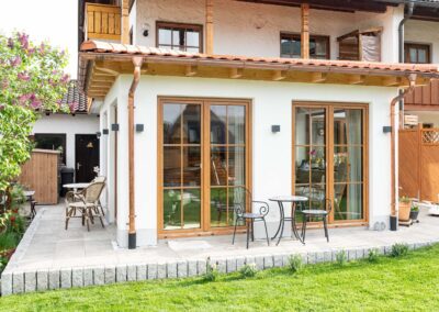 Wintergarten-Anbau mit Balkonsanierung von MFB Holz- und Trockenbau OHG